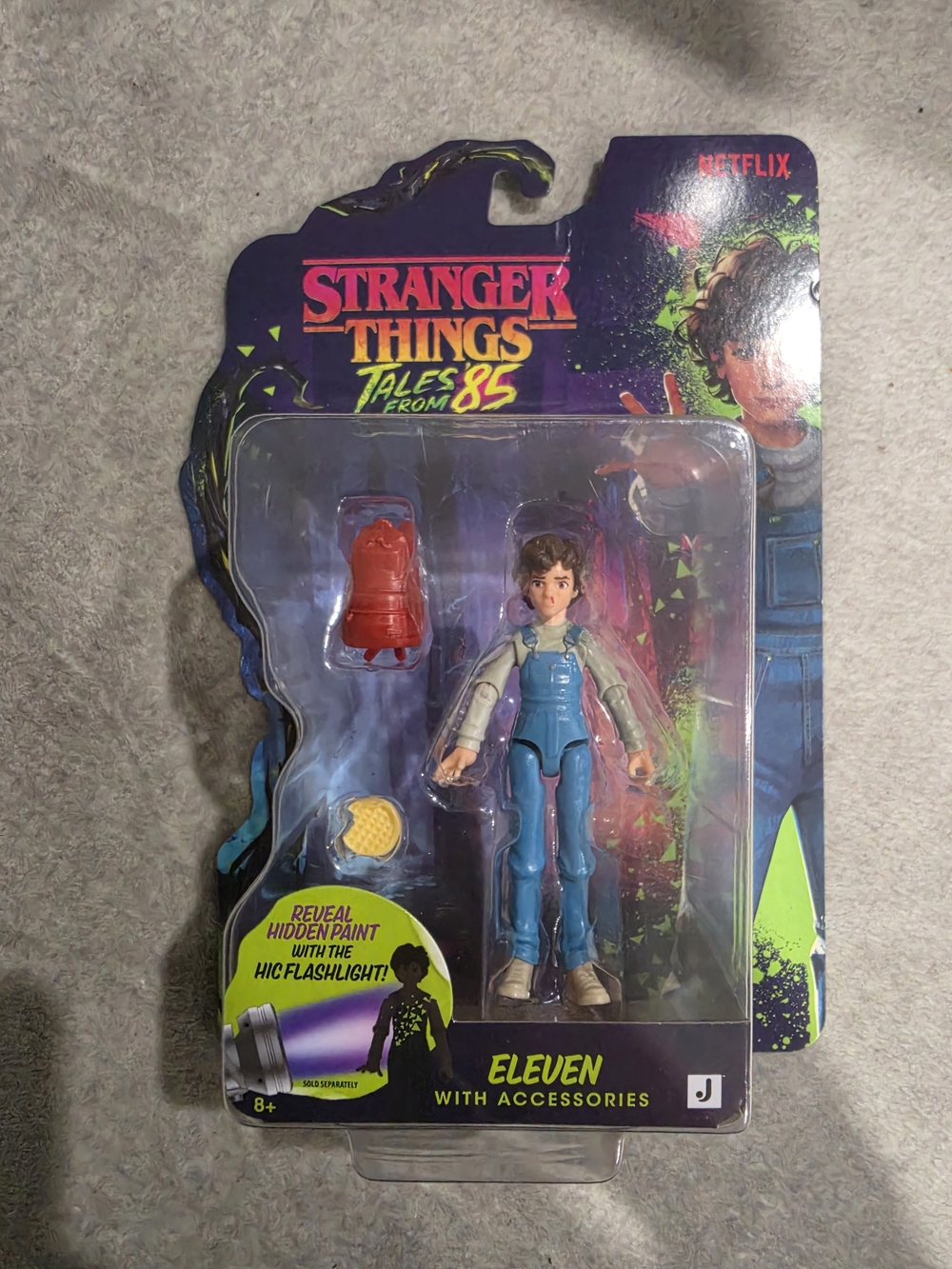 Netflix Eleven Figure with Bright Blue Outfit and Neon Accents